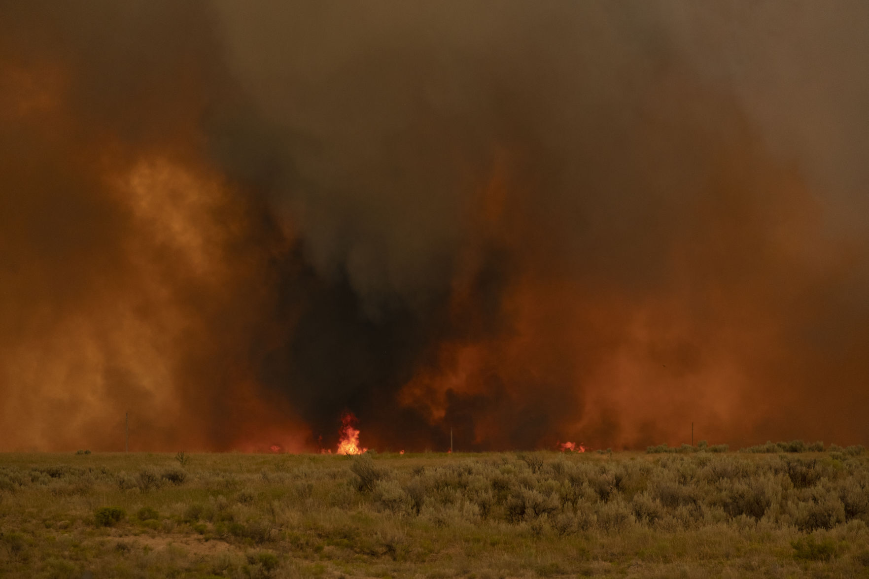 Wildfire burns near Declo